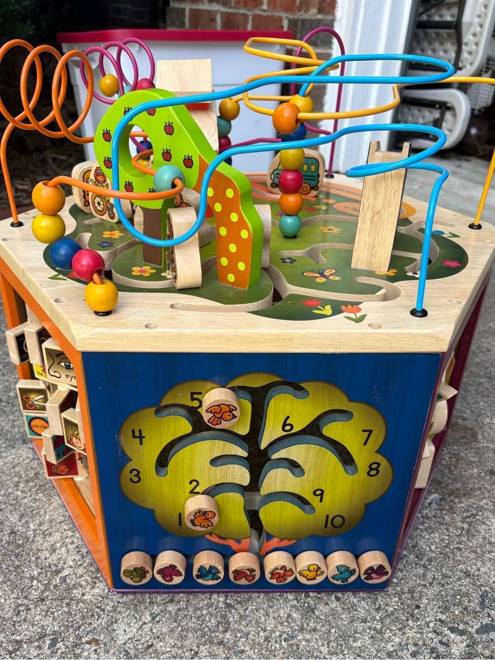 B. toys Youniversity Wooden Activity Cube